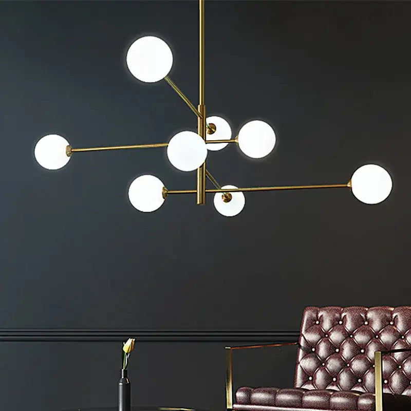 Elegant black gold glass ball chandelier with multiple white spherical glass globes for living room lighting