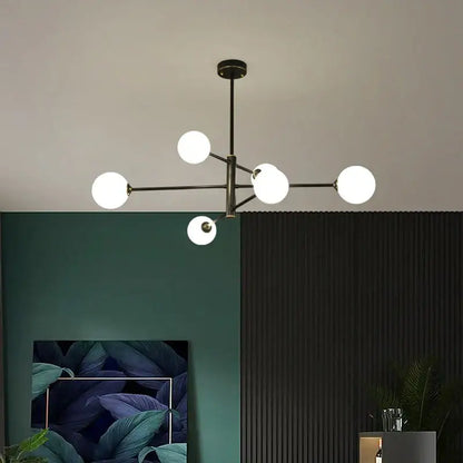Elegant black gold glass ball chandelier with six frosted glass globe lights for modern living room lighting