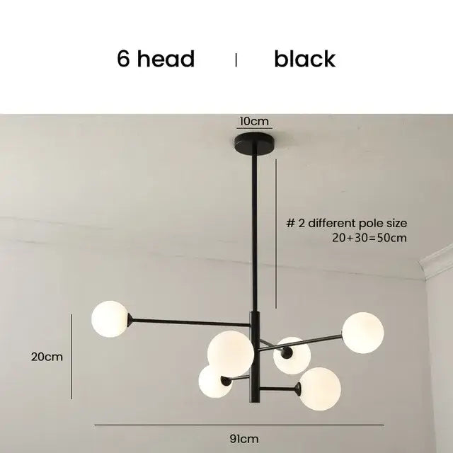 Elegant black gold glass ball chandelier with six spherical white globe lights for living room lighting