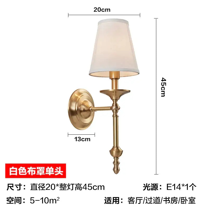 Antique brass wall lamp with white fabric shade featuring decorbites black gold wall design for bedroom decor