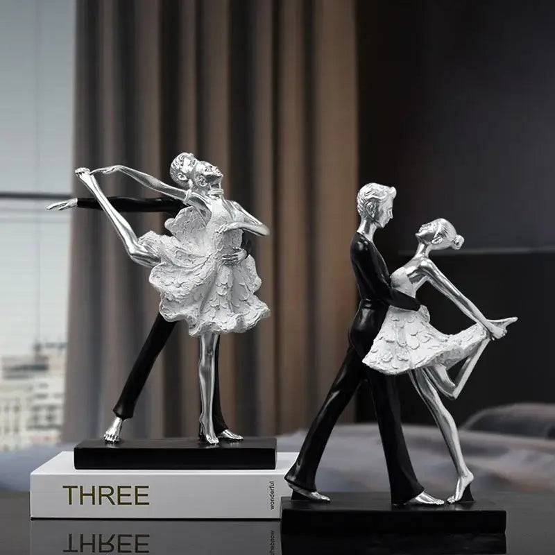 Elegant black and white ballet dance girl double statue featuring silver and black textured skirts for living room decor