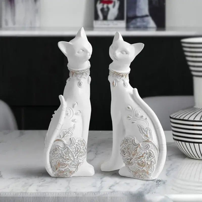 Two elegant white ceramic cat statues with silver floral patterns and embellishments for living room decorbites cat decor