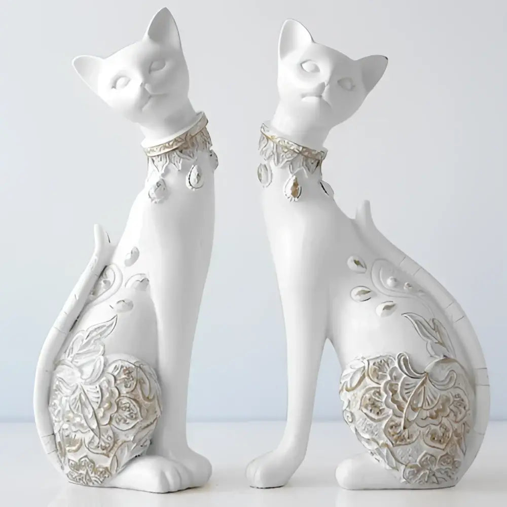 Two elegant white ceramic decorbites cat statues with silver lace patterns and beaded necklaces for living room decor