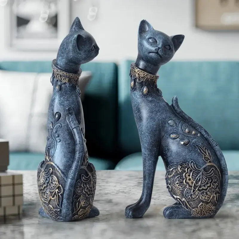 Elegant blue and gold decorbites cat statue made of dark blue resin with gold leaf patterns for living room decor