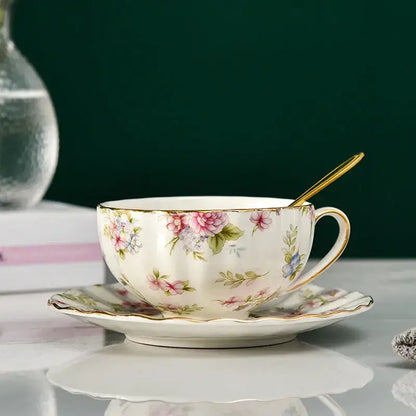 Elegant blue and pink floral porcelain tea cup set with delicate gold trim for dining room use
