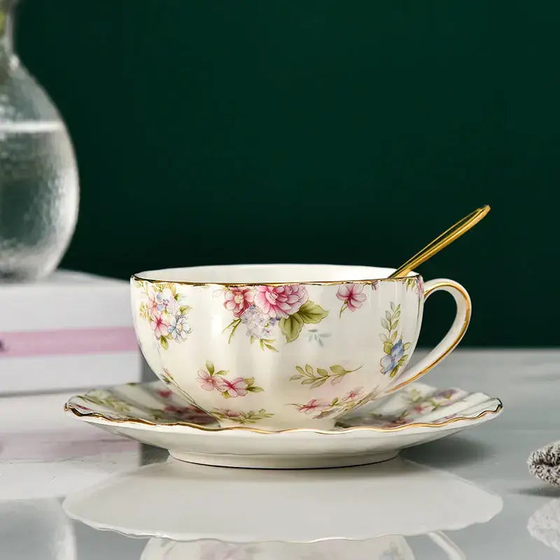 Elegant blue and pink floral porcelain tea cup set with delicate gold trim for dining room use