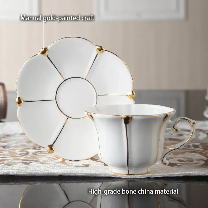 Elegant bone china teacup and saucer set in white with gold trim for refined dining room decorbites elegant bone china