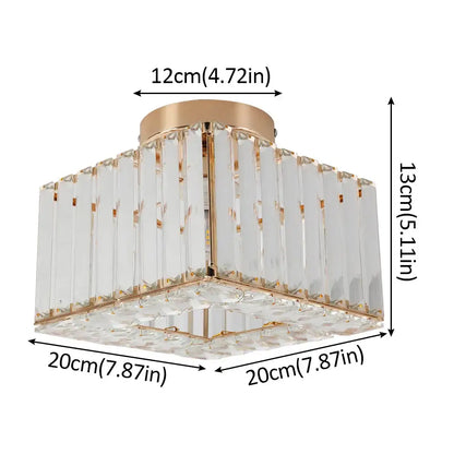 A modern pendant light with a gold brass frame and decorbites crystal led panels for elegant dining room decor