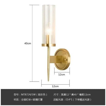 Elegant brass and black glass tube wall sconce with a brass-finished metal body and clear glass shade for living room decorbites copper wall style