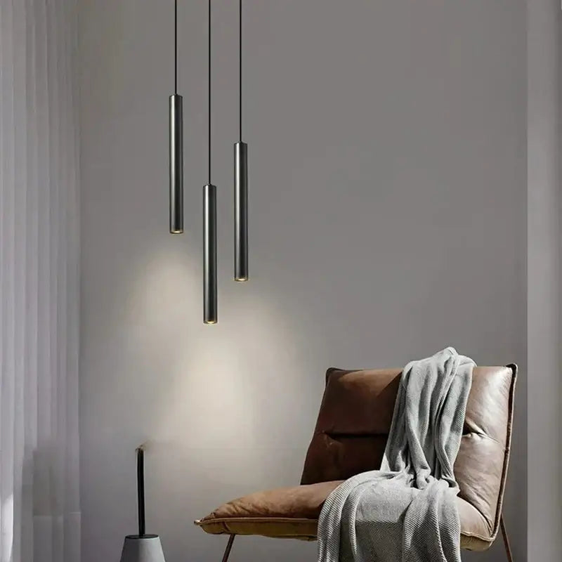 Three sleek matte black cylindrical pendant lights from decorbites elegant brass pendant for dining room decor