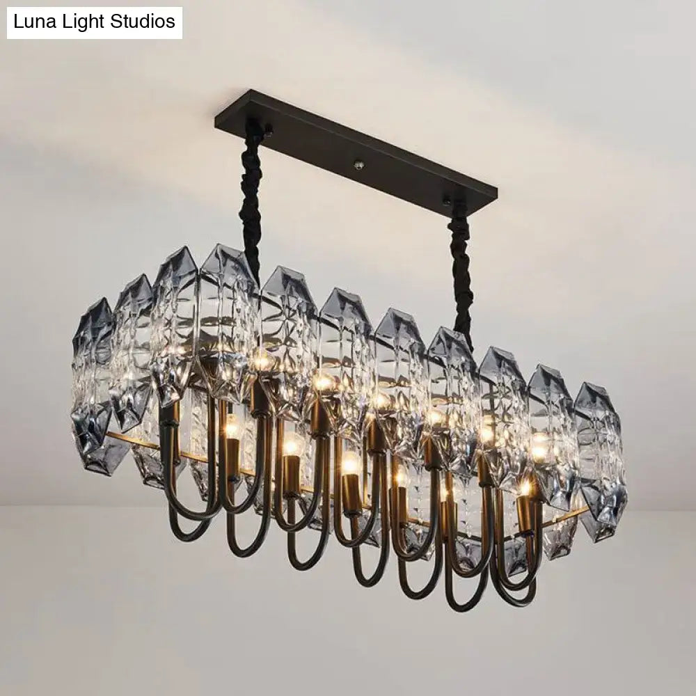DecorBites 14-head crystal flute hanging ceiling light with faceted crystals and twisted black chains island lighting idea