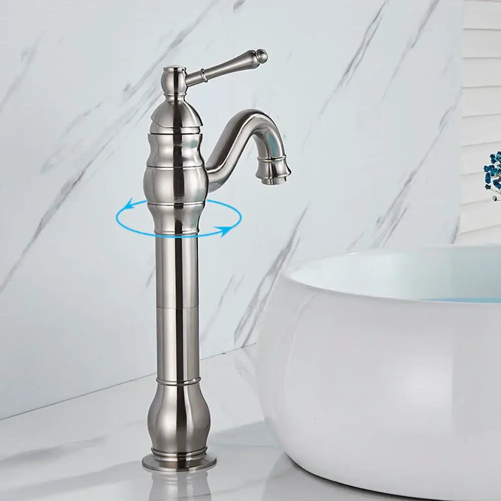 Stylish brushed nickel single handle sink faucet with curved spout and ridged body for bathroom use
