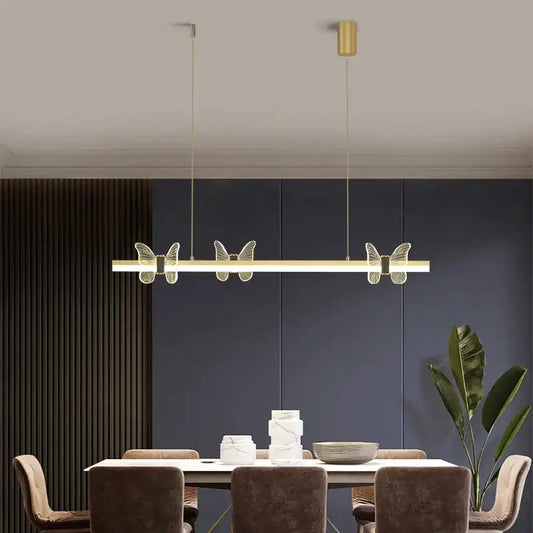 Gold-toned decorbites elegant butterfly linear pendant light with translucent wings for modern dining room decor
