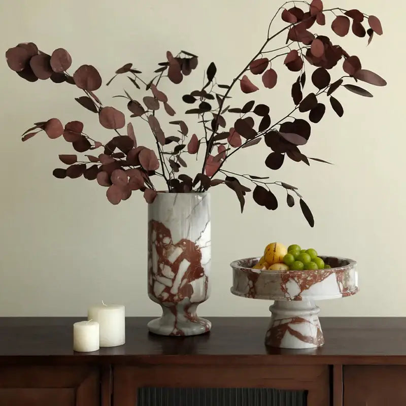 A tall elegant ceramic marble vase with calacatta red white and rust colors for living room decor by decorbites