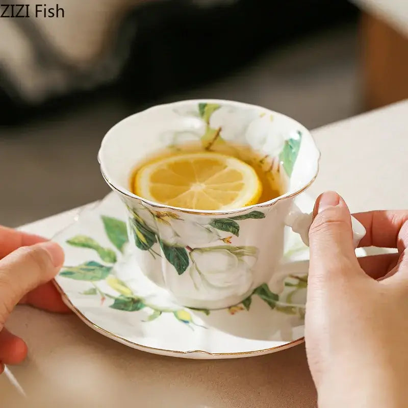 Elegant camellia porcelain cup and saucer with green floral patterns and gold rim by decorbites camellia porcelain tea set