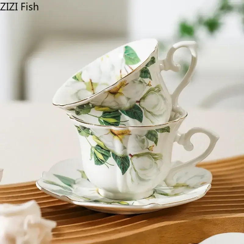 White porcelain camellia porcelain cup and saucer with green floral patterns and gold trim by decorbites camellia