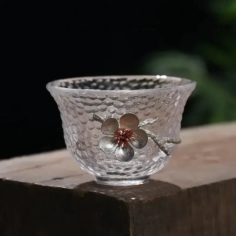 Elegant carved tin glass tea cup set with clear hammered glass cup adorned with silver cherry blossom accent