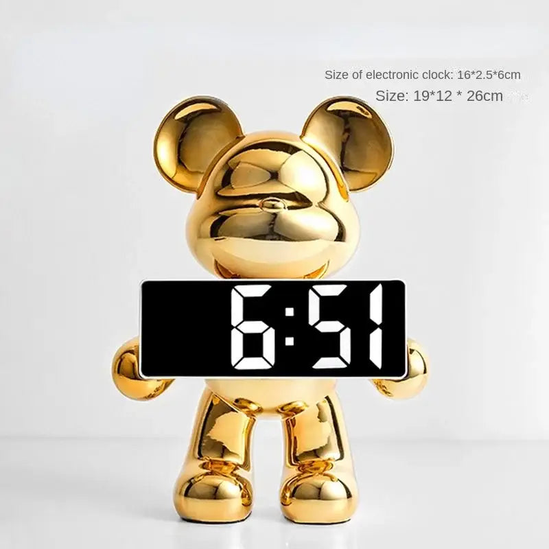 Elegant golden glossy bear clock ornament with black digital display showing 6:51 for living room decor