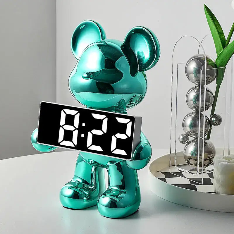 Shiny teal metallic bear clock ornament with black digital display showing 8 22 for elegant living room decor