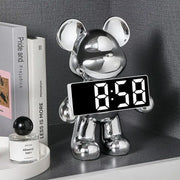 Shiny chrome-plated bear clock ornament with a black digital display showing white numerals for living room decor