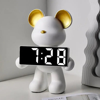 Elegant white ceramic bear clock ornament with gold ears and nose holding digital display showing 7 28