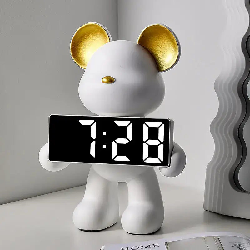 Elegant white ceramic bear clock ornament with gold ears and nose holding digital display showing 7 28