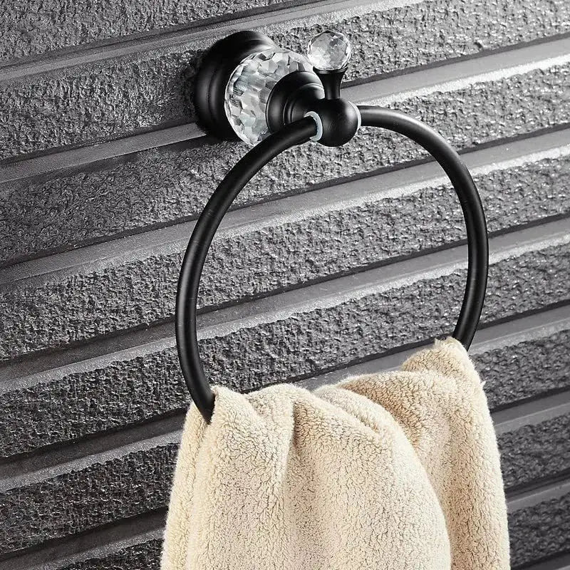 Black metal towel holder with crystal accents holding a beige towel decorbites crystal towel holder for bathroom wall rack