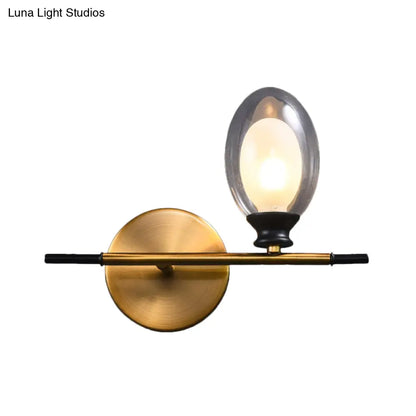 DecorBites™ DecorBites™ Elegant Clear/Amber Glass Egg Shape Wall Light - Minimalist 1 Light Brass Sconce