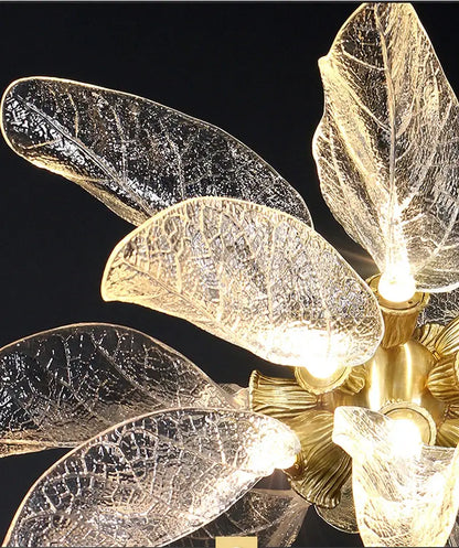 Elegant copper chandelier light with golden leaf-shaped glass petals featuring intricate veining and warm glow decorbites elegant copper