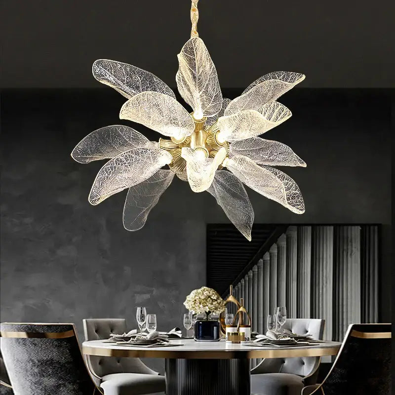 Elegant copper chandelier light featuring gold-toned metal and translucent leaf glass petals for dining room decorbites elegant copper