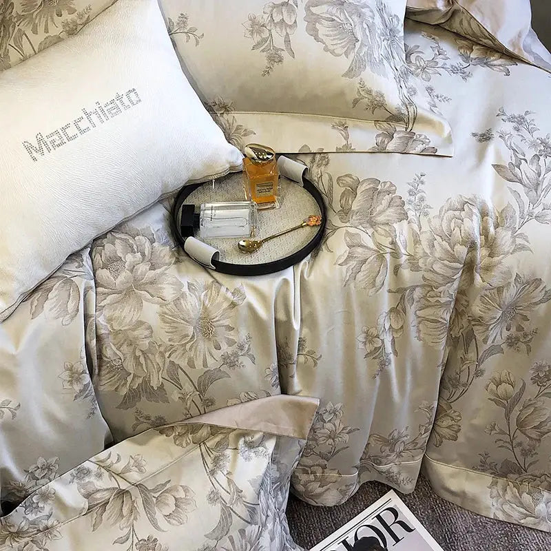 Cream satin floral bedding set with delicate gray pattern and matching pillows made from decorbites 1200tc egyptian cotton