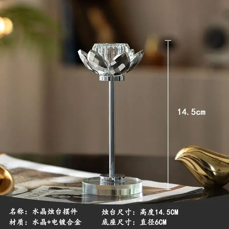 Elegant crystal and gold candle holder set featuring a lotus-shaped crystal holder with chrome stem and base for dining decor
