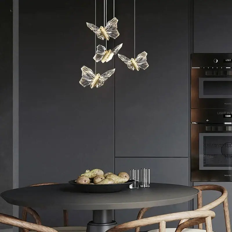 Elegant crystal butterfly pendant lamps with gold accents in glass create luxury bedroom and kitchen lighting decorbites crystal butterfly