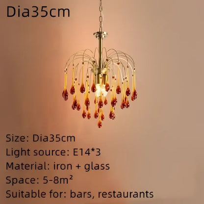 A brass-finished elegant crystal ceiling chandelier with amber and clear glass beads for dining room decorbites elegant crystal
