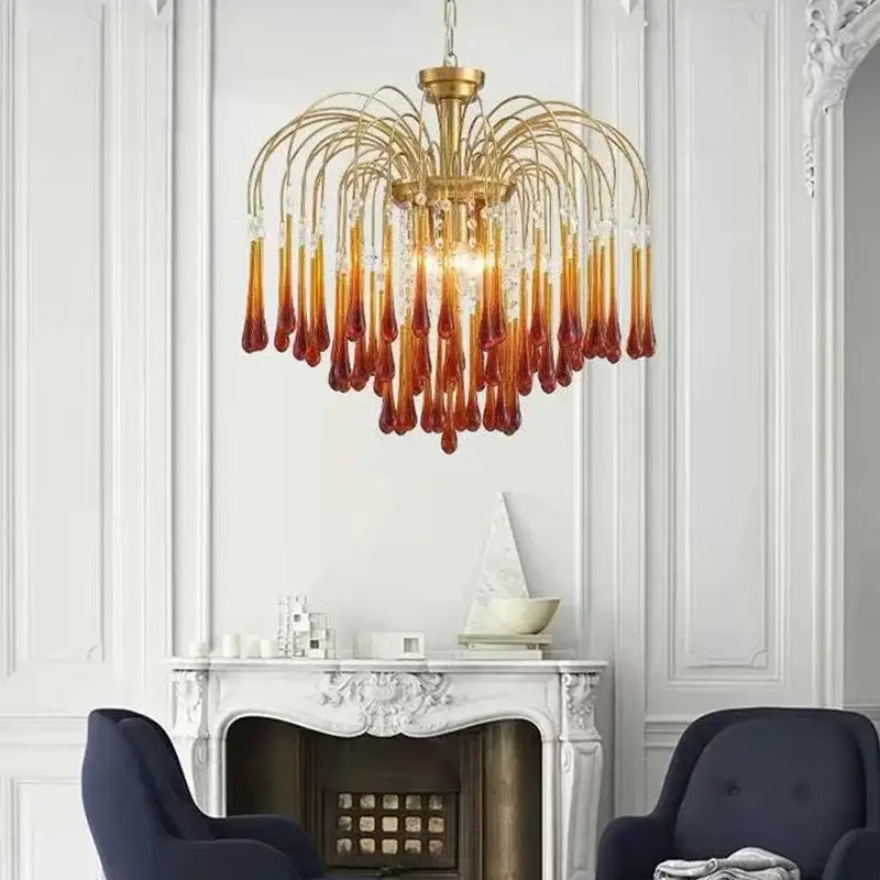 Elegant crystal ceiling chandelier with cascading amber and clear glass teardrop pendants for dining room decorbites elegant crystal
