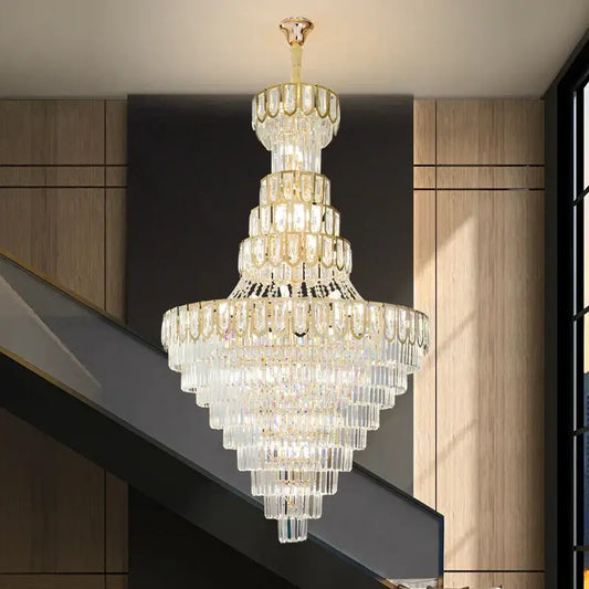Decorbites elegant crystal chandelier with gold-toned frame and cascading clear glass prisms for living room decor
