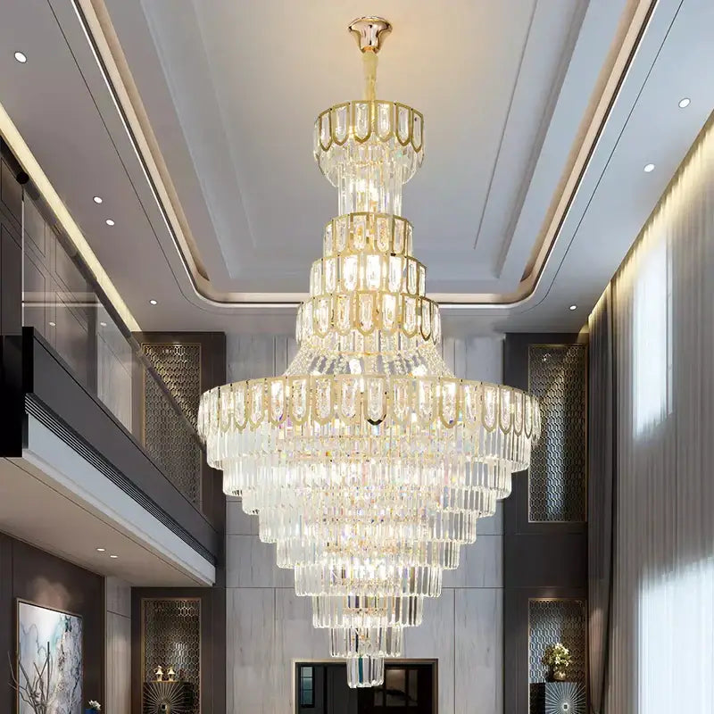 A decorbites elegant crystal chandelier with gold metal accents and cascading clear faceted crystals for living room decor