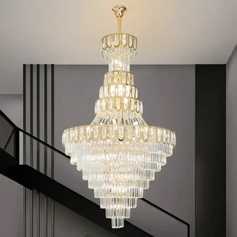 Elegant crystal chandelier by decorbites with gold metal accents and cascading clear glass prisms for living room decor