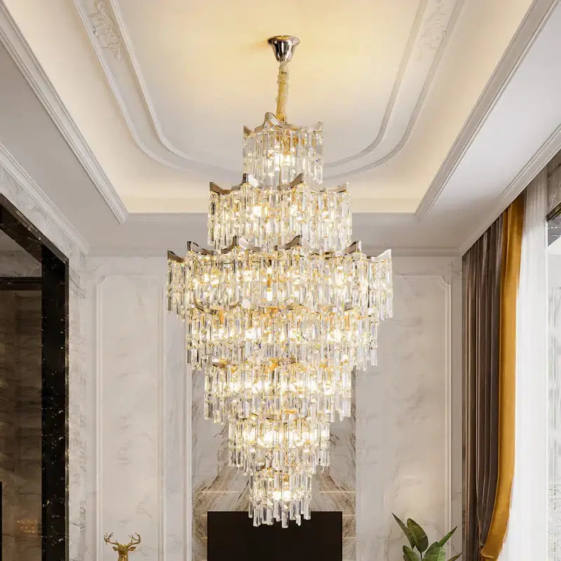 Decorbites elegant crystal multi-tiered chandelier with gold accents and clear glass prisms for living room decor