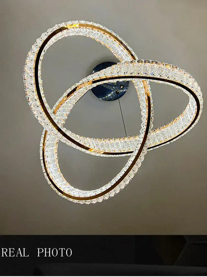 A decorbites elegant crystal chandelier with gold spiral metal frames and clear crystals for living room decor