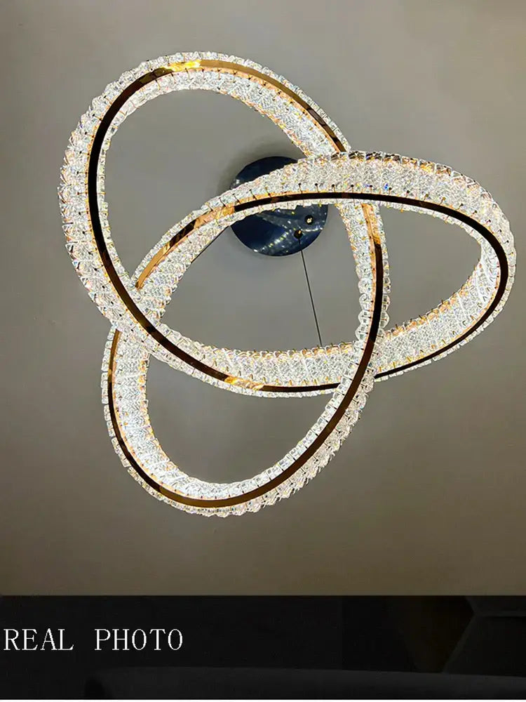 A decorbites elegant crystal chandelier with gold spiral metal frames and clear crystals for living room decor