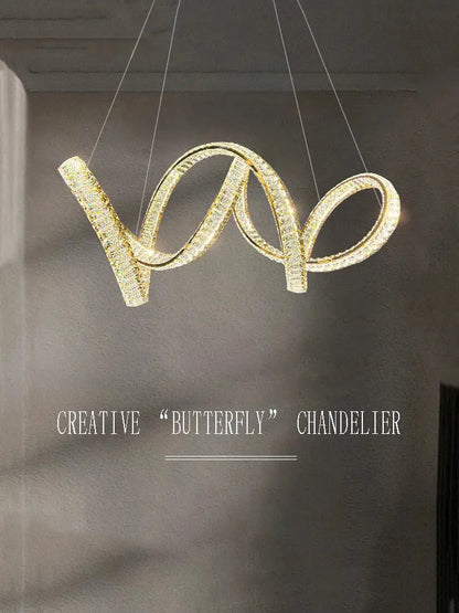 Gold-toned crystal-encrusted butterfly-shaped elegant crystal chandelier with modern swirling design for living room decorbites elegant crystal