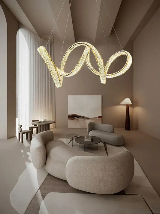 A decorbites elegant crystal chandelier in gold with a modern intertwined spiral design for living room lighting