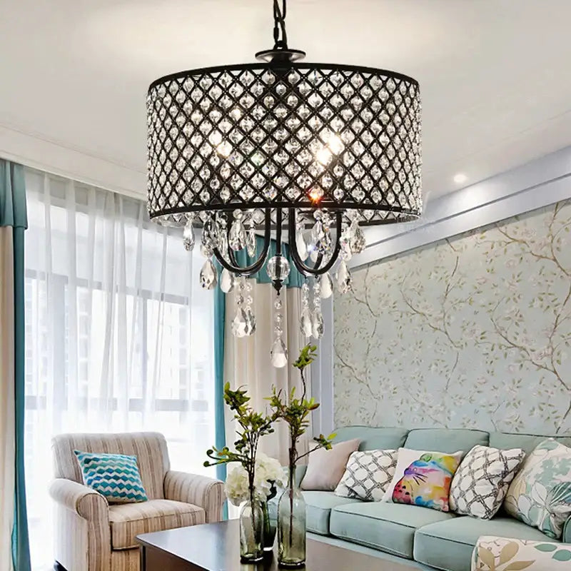 Black metal pendant light with diamond-patterned cage and dangling crystal teardrops elegant crystal chandelier for dining room