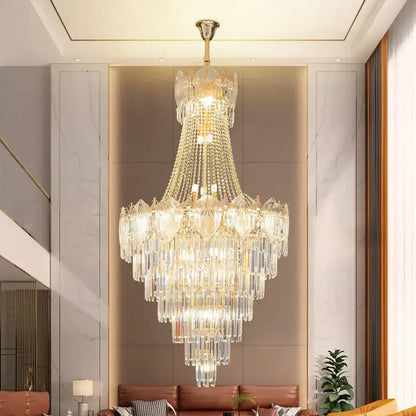 Elegant crystal duplex chandelier with cascading clear glass prisms and gold accents in modern living room decorbites elegant crystal