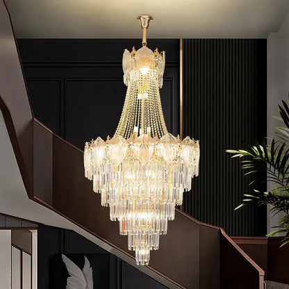 Elegant crystal duplex chandelier featuring gold-toned metal frame and cascading clear glass prisms for decorbites elegant crystal decor