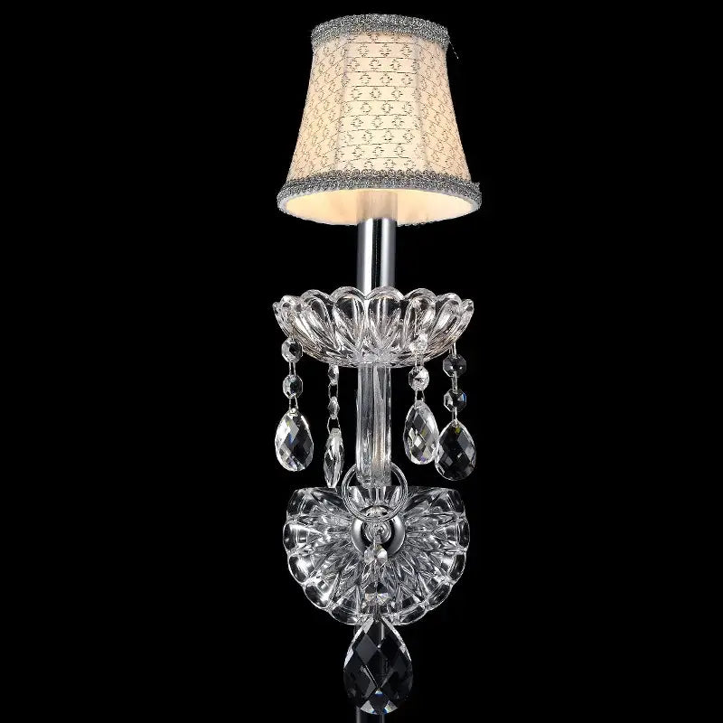 Elegant crystal lamp wall light with silver metal frame, clear faceted glass, teardrop crystals, and silk lampshade for bedroom decorbites wall light