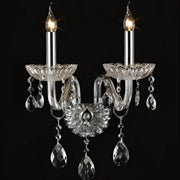 Elegant crystal lamp wall light with clear glass arms, two lit candle bulbs, and teardrop crystals for bedroom decorbites crystal lamp