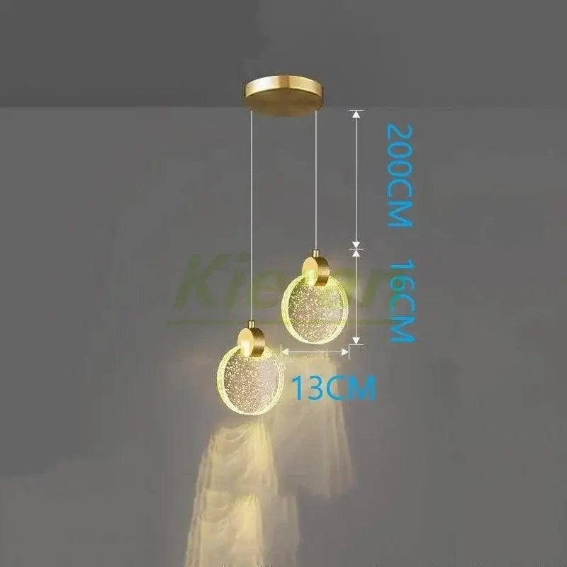 Gold-toned decorbites elegant crystal led pendant light with two sparkling glass orbs for dining room decor