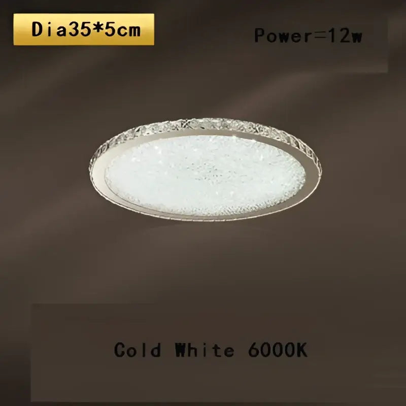 Elegant crystal round ceiling lamp with clear crystal-encrusted rim and frosted glass emitting cold white light